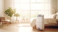 Air purifier in cozy white bedroom for filter and cleaning removing dust PM2.5 HEPA and virus in home,for fresh air and healthy Royalty Free Stock Photo