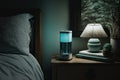 air purifier on nightstand, with lamp and glass of water nearby