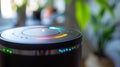 The air quality sensor on an air purifier displaying a colorcoded indicator for the current level of pollutants in the