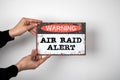 Air raid alert Warning Concept. Warning sign on a white background Royalty Free Stock Photo