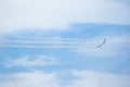 Air show, aircraft group flying leaving smoke trail