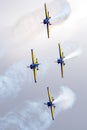 Air Show scene with stunt airplane of aerobatic team performing formation acrobatics Royalty Free Stock Photo