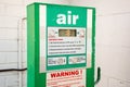 Air station service for vehicle tires. Automatic inflator with pressure level indicator on 33 psi at gas station. Self service air Royalty Free Stock Photo