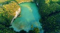 AIR. Top view of the cliffs of the turquoise beach lagoon of the tropical island white and the islands on the Krabi Royalty Free Stock Photo