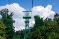 Air tour in the cable car over the green forest Royalty Free Stock Photo