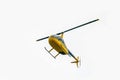 Yellow helicopter down into the forest Royalty Free Stock Photo