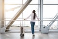 Air Transportation. Black Woman Looking At Plane While Waiting Flight In Airport Royalty Free Stock Photo