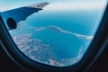 Air Travel, airplane window, over Australia, seascape Royalty Free Stock Photo