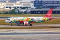 AirAsia Airbus A320 airplane at Bangkok Don Mueang Airport in Thailand Amazing New Chapters special livery