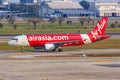 AirAsia Airbus A320 airplane at Bangkok Don Mueang Airport in Thailand