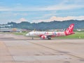 AirAsia Airbus preparing for take-off from Penang International airport in Malaysia.