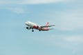 AirAsia Airline Airplane Landing at Singapore Changi International Airport, Singapore, April 2018 Royalty Free Stock Photo