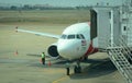 AirAsia airplane docking at airport in Penang, Malaysia