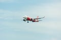 AirAsia Airplane Landing at Singapore Changi International Airport, Singapore, April 2018 Royalty Free Stock Photo