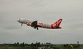 AirAsia airplane taking off at the airport in Kalibo, Philippines
