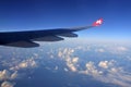 AirAsia Airplane Wing Above Blue Sky Clouds