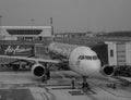 AirAsia plane loading passengers at KLIA 2 Airport in Malaysia