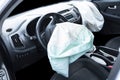 Airbag exploded at a car after the accident. Driver and Passenger AirBag. Car crash. Interior of a car after crash. Inside Royalty Free Stock Photo