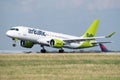 AirBaltic Airbus A220 landing in Roissy Charles de Gaulle airport in Paris, France