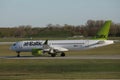 AirBaltic jet plane taxiing in airport