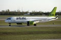 AirBaltic jet plane taxiing in airport