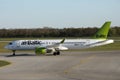 AirBaltic jet plane taxiing in airport