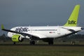 AirBaltic jet plane taxiing in airport