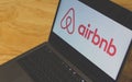 Airbnb logo on laptop screen