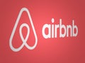 Airbnb logo on a red background Royalty Free Stock Photo