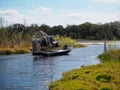 Airboat Navigating Channel in Southern Florida Royalty Free Stock Photo