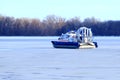 The airboat of the rescue service rides on the ice of a frozen river, patrols the lake in winter. Special vehicle, emergency