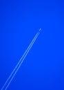 Airborne jet on blue sky