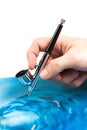 Airbrush in hand Royalty Free Stock Photo