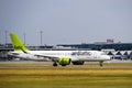 Airbus A220-300 aircraft of Airbaltic airline company on the runway at Riga International Airport. Riga International Airport,
