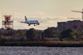 An Airbus A321 airplane by American Airlines is landing descending to land on Ronald Reagan National Airport