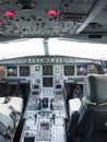 Airbus A330 airplane's cockpit with front, overhead and pedestrian panel Royalty Free Stock Photo