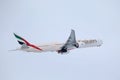 Airbus A380 Emirates plane flying over Munich Airport, Germany