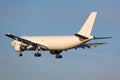 Airbus A300 civil cargo airplane landing in airport