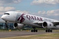 Airbus A350-941 commercial aircraft with a hybrid Airbus/Qatar Airways livery