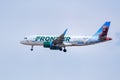 Airbus A320 Jojo the Grizzly Bear operated by Frontier flying near Denver International Airport, Colorado