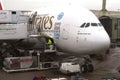 Modern Emirates Airbus A380 is loading cargo at Schiphol airport, Amsterdam, Netherlands