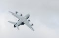 Airbus A400M Atlas military transport plane climbing steeply