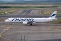 An Airbus A321, operated by the Finnish flag carrier Finnair, taxiing at Helsinki airport