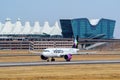 Airbus A320 operated by Volaris taxiing at Denver International Airport, Colorado