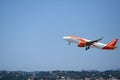 Airbus A320 over the Corfu town Royalty Free Stock Photo