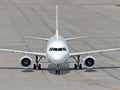 An Airbus A318 plane on tarmac image Royalty Free Stock Photo