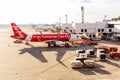 Airbus A320-200 Thai Airasia connected to jetway at Don Muang in