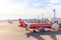 Airbus A320-200 Thai Airasia connected to jetway at Don Muang in