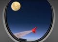 Airbus a380 window view during a night flight in a moonlit night Royalty Free Stock Photo