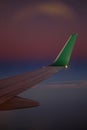 Airbus wing at sunset during flight